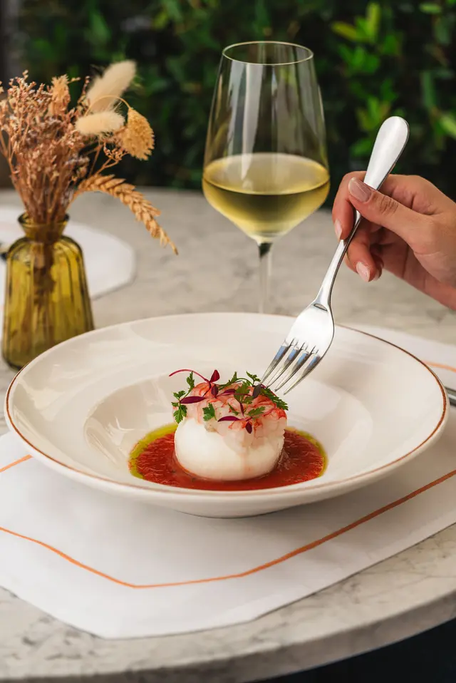 SupperClub dining experience with cocktail by the pool